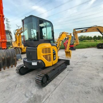 2023 Komatsu PC35MR mini excavator, rear three-quarter view 2023 Komatsu PC35MR mini excavator, rear three-quarter view