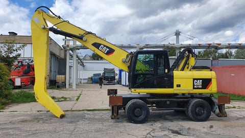 2011 Caterpillar M318D MH material handler, side view 2011 Caterpillar M318D MH material handler, side view
