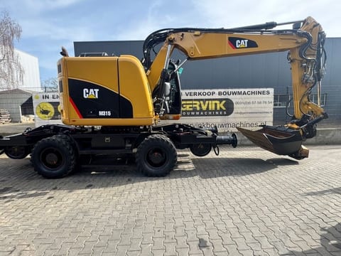 2016 Caterpillar M315 wheel excavator, side view 2016 Caterpillar M315 wheel excavator, side view