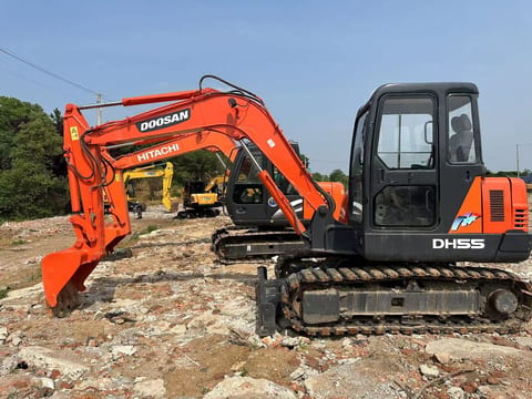 2022 Doosan DH55 mini excavator, side profile view 2022 Doosan DH55 mini excavator, side profile view