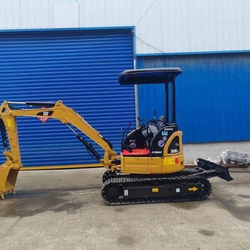 2022 Caterpillar 303E mini excavator, side profile view 2022 Caterpillar 303E mini excavator, side profile view