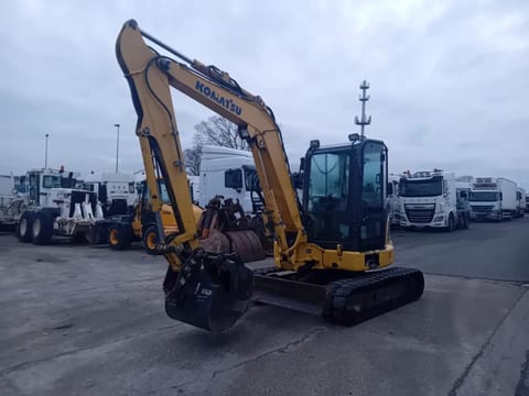 2018 Komatsu PC-55MR mini excavator, front three-quarter view 2018 Komatsu PC-55MR mini excavator, front three-quarter view