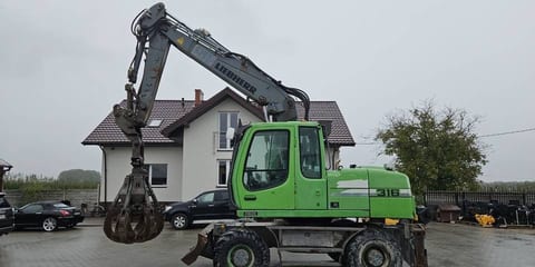 2011 Liebherr A316 LITRONIC wheel excavator side view