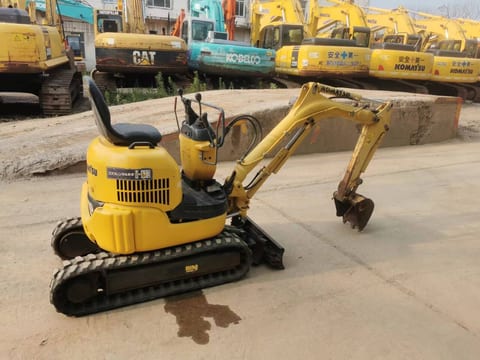 2023 Komatsu PC10MR mini excavator, rear three-quarter view 2023 Komatsu PC10MR mini excavator, rear three-quarter view