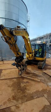 2022 Komatsu PC88MR-11EO mini excavator, side view with fork attachment 2022 Komatsu PC88MR-11EO mini excavator, side view with fork attachment