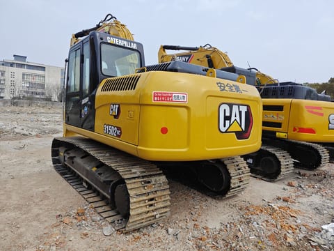 Caterpillar 315D2GC crawler excavator, rear three-quarter view Caterpillar 315D2GC crawler excavator, rear three-quarter view