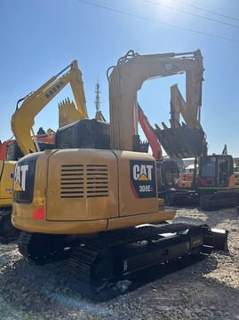 2024 Caterpillar 308E2 crawler excavator, rear three-quarter view 2024 Caterpillar 308E2 crawler excavator, rear three-quarter view