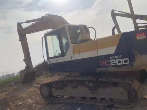 Komatsu PC200 crawler excavator, side view Komatsu PC200 crawler excavator, side view