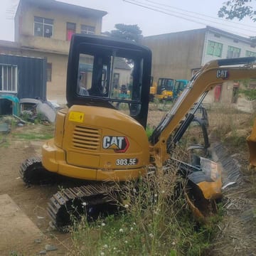 2021 Caterpillar 303.5E mini excavator, rear three-quarter view 2021 Caterpillar 303.5E mini excavator, rear three-quarter view
