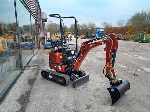 Mole M12 mini excavator, three-quarter view Mole M12 mini excavator, three-quarter view