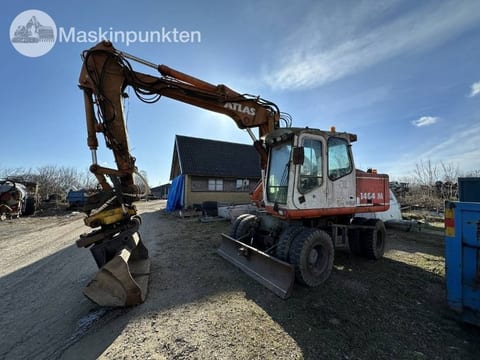 2001 Atlas 1404 M wheel excavator, front three-quarter view 2001 Atlas 1404 M wheel excavator, front three-quarter view