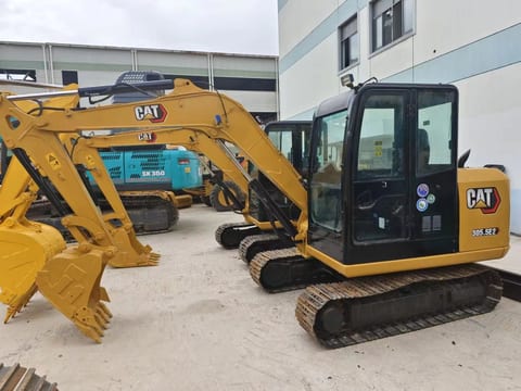 2022 Caterpillar 305.5E2 mini excavator, side view 2022 Caterpillar 305.5E2 mini excavator, side view