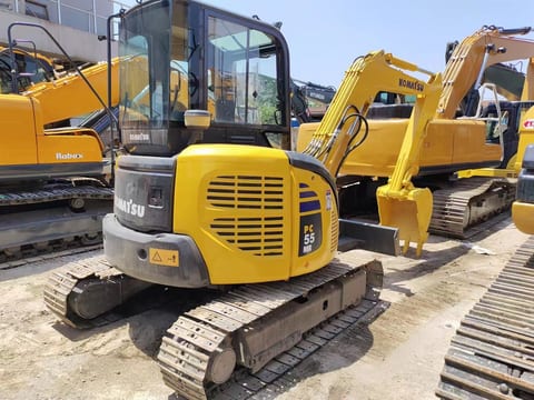 2018 Komatsu PC-55MR mini excavator, rear three-quarter view 2018 Komatsu PC-55MR mini excavator, rear three-quarter view