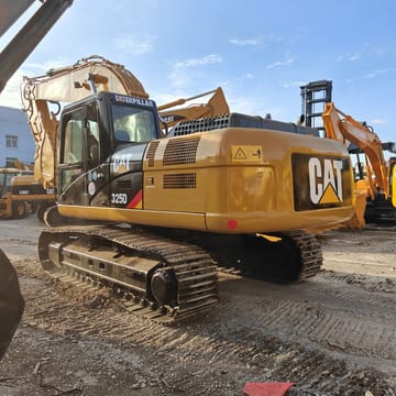 Caterpillar 325D crawler excavator, rear three-quarter view Caterpillar 325D crawler excavator, rear three-quarter view