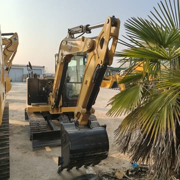 2026 Caterpillar 305.5E2 mini excavator, front three-quarter view 2026 Caterpillar 305.5E2 mini excavator, front three-quarter view