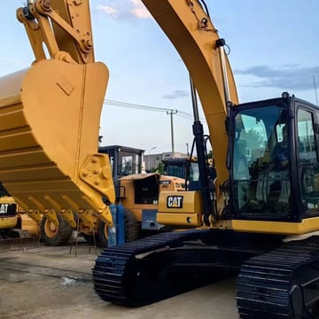 2021 Caterpillar 320 crawler excavator, side view of cab and bucket 2021 Caterpillar 320 crawler excavator, side view of cab and bucket