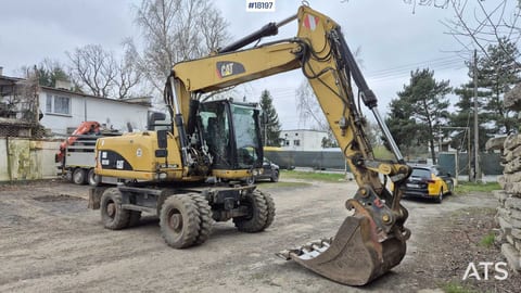 2010 Caterpillar M318D wheel excavator, side profile view 2010 Caterpillar M318D wheel excavator, side profile view