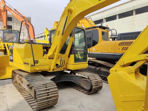 2017 Komatsu PC130-7 crawler excavator, rear three-quarter view 2017 Komatsu PC130-7 crawler excavator, rear three-quarter view