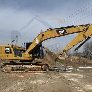 Caterpillar 320GC crawler excavator, side view Caterpillar 320GC crawler excavator, side view