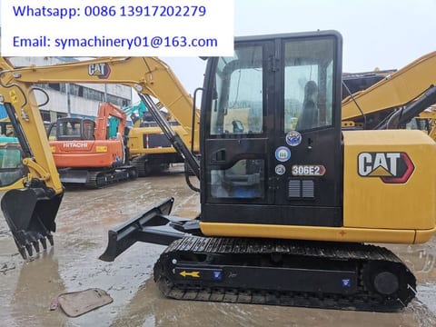 2023 Caterpillar 306E2 mini excavator side view 2023 Caterpillar 306E2 mini excavator side view
