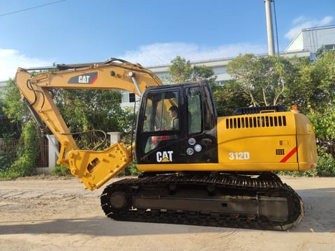 Caterpillar 312D crawler excavator, side profile view Caterpillar 312D crawler excavator, side profile view