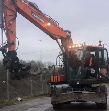 2019 Doosan DX140W-5 wheel excavator, front view 2019 Doosan DX140W-5 wheel excavator, front view