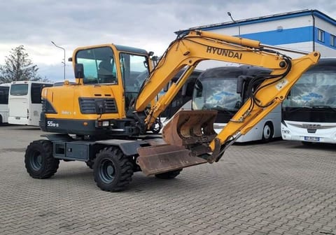 2014 Hyundai R55W-9 wheel excavator, side view 2014 Hyundai R55W-9 wheel excavator, side view