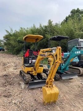 2024 Komatsu PC18MR-3 mini excavator, front three-quarter view 2024 Komatsu PC18MR-3 mini excavator, front three-quarter view