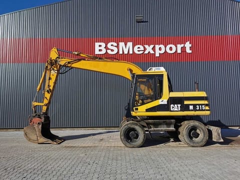 1996 Caterpillar M315 wheel excavator, side profile view 1996 Caterpillar M315 wheel excavator, side profile view