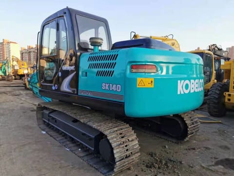 2022 Kobelco SK140-8 crawler excavator, rear three-quarter view 2022 Kobelco SK140-8 crawler excavator, rear three-quarter view