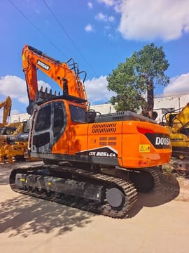 2024 Doosan DX225LCA crawler excavator, rear three-quarter view 2024 Doosan DX225LCA crawler excavator, rear three-quarter view