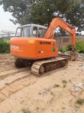 2017 Hitachi EX60 mini excavator, rear three-quarter view 2017 Hitachi EX60 mini excavator, rear three-quarter view