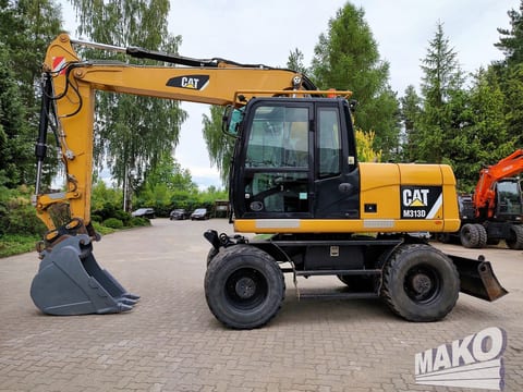 2016 Caterpillar M313D wheel excavator side view 2016 Caterpillar M313D wheel excavator side view