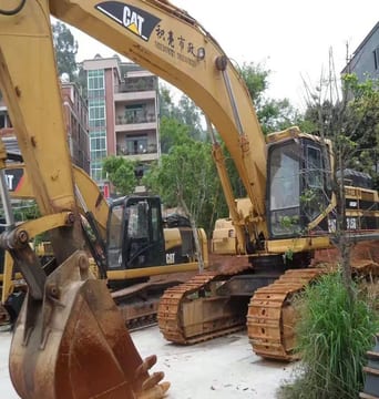 2011 Caterpillar 345BL crawler excavator, front three-quarter view 2011 Caterpillar 345BL crawler excavator, front three-quarter view