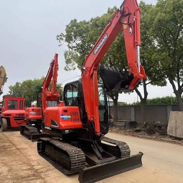2022 Doosan DX60-9C mini excavator, front three-quarter view 2022 Doosan DX60-9C mini excavator, front three-quarter view