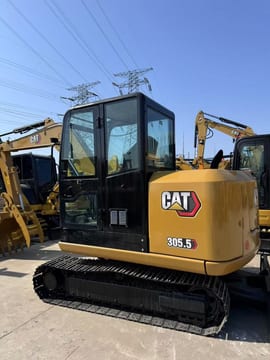 2024 Caterpillar 305.5 mini excavator, rear three-quarter view