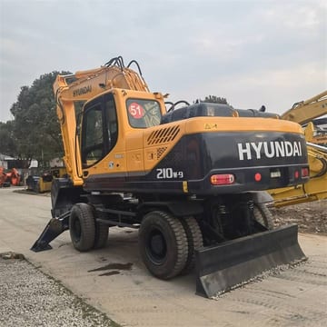 2024 Hyundai R210W-9T wheel excavator, rear three-quarter view 2024 Hyundai R210W-9T wheel excavator, rear three-quarter view