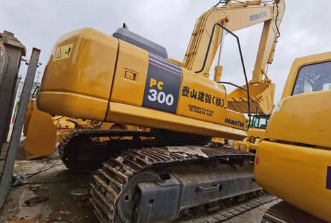 2019 Komatsu PC300-7 crawler excavator, rear three-quarter view 2019 Komatsu PC300-7 crawler excavator, rear three-quarter view