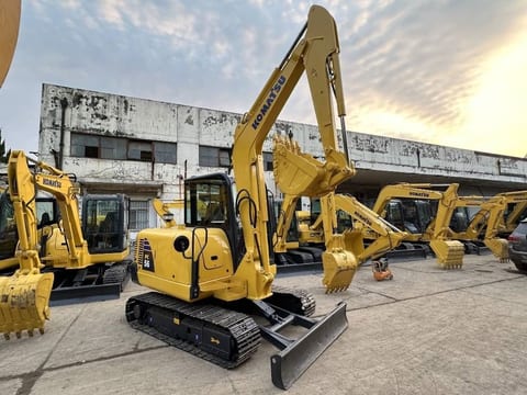 2023 Komatsu PC56-7 mini excavator, front three-quarter view 2023 Komatsu PC56-7 mini excavator, front three-quarter view