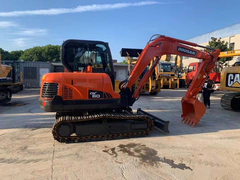 2021 Doosan DX60 mini excavator side view 2021 Doosan DX60 mini excavator side view