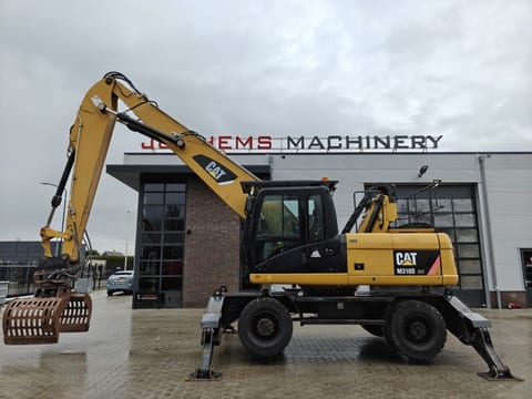 2010 Caterpillar M318D MH demolition excavator, side view 2010 Caterpillar M318D MH demolition excavator, side view