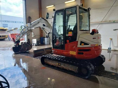2016 Takeuchi TB260 mini excavator, rear three-quarter view 2016 Takeuchi TB260 mini excavator, rear three-quarter view