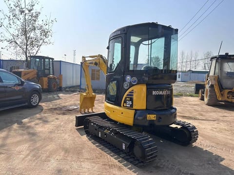 2021 Komatsu PC35MR mini excavator, rear three-quarter view 2021 Komatsu PC35MR mini excavator, rear three-quarter view