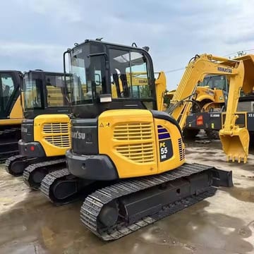 2024 Komatsu PC-55MR mini excavator, rear three-quarter view 2024 Komatsu PC-55MR mini excavator, rear three-quarter view