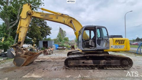 2005 New Holland E215 crawler excavator, side view 2005 New Holland E215 crawler excavator, side view