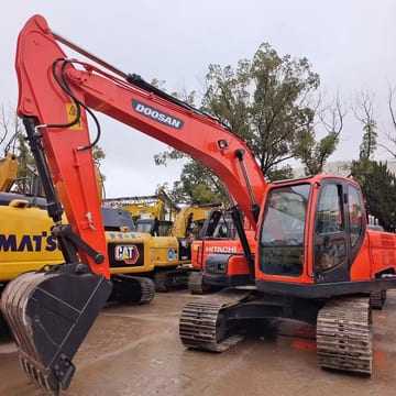 2017 Doosan DX140 excavator, front three-quarter view