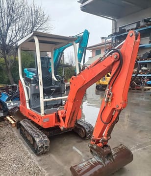 2001 Schaeff HR13 mini excavator, rear three-quarter view 2001 Schaeff HR13 mini excavator, rear three-quarter view