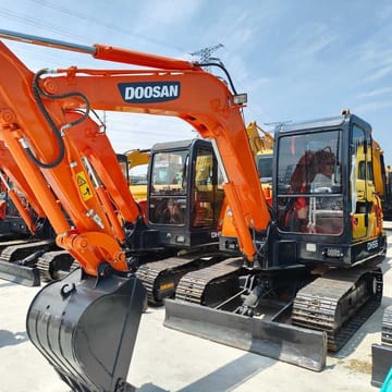 2024 Doosan DH55 mini excavator, front three-quarter view