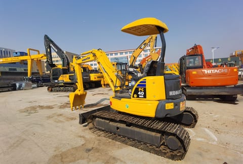 2022 Komatsu PC40MR mini excavator, rear three-quarter view 2022 Komatsu PC40MR mini excavator, rear three-quarter view