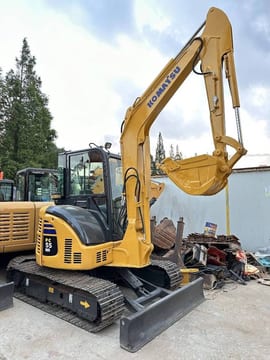 2024 Komatsu PC-55MR mini excavator, front three-quarter view 2024 Komatsu PC-55MR mini excavator, front three-quarter view